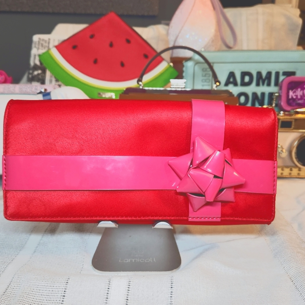 Kate Spade pink and red bow clutch